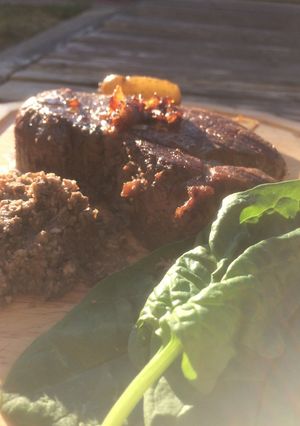 A picture of Seared and Grilled Filet Mignon With Confit New Potatoes, Red Wine Onion Marmalade, Mushroom Duexelles and Baby Spinach.