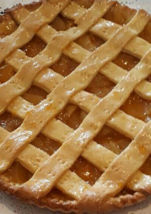 Una foto de Kuchen de durazno y manzanas