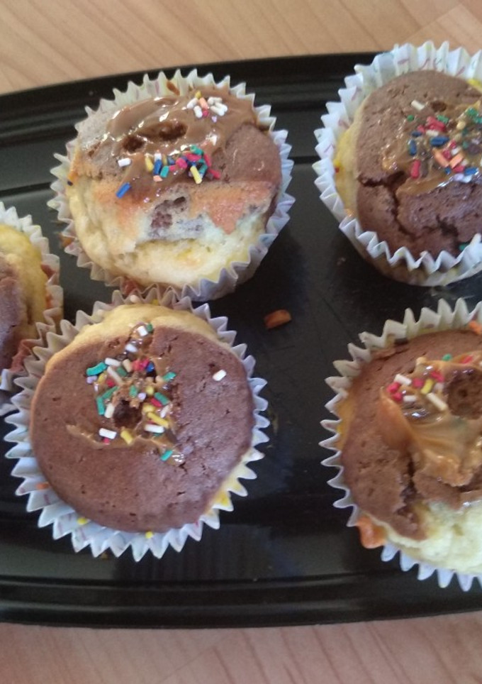 Una foto de Magdalenas rellenas con dulce de leche marmoladas 😎😋🤩
