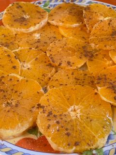 Una foto de Naranja con azúcar y canela