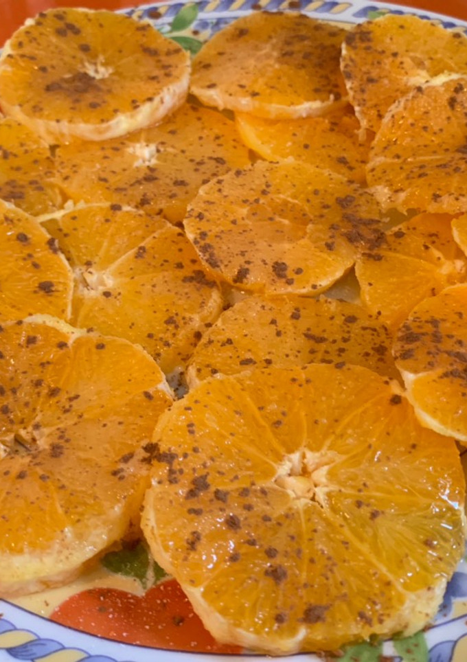 Una foto de Naranja con azúcar y canela
