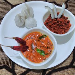 Garlic coconut chutney and tomato garlic chutney A picture of Garlic coconut chutney and tomato garlic chutney.