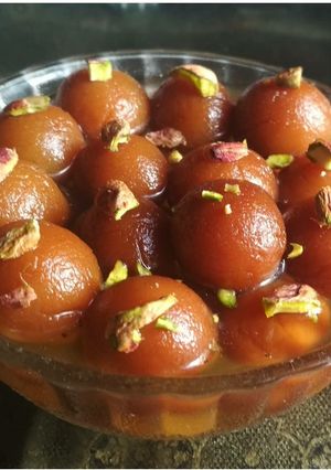 A picture of Wheat flour gulab jamun.