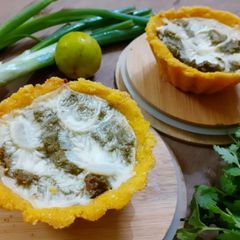 A picture of Mixed Saag Filled Cheezy Makka Tarts.