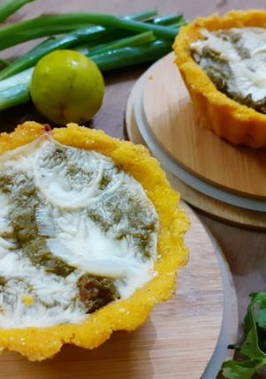 A picture of Mixed Saag Filled Cheezy Makka Tarts.
