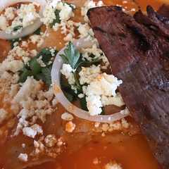 Una foto de Entomatadas a la Oaxaqueña