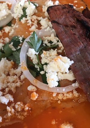 Una foto de Entomatadas a la Oaxaqueña