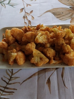 Una foto de Coliflor al ajillo