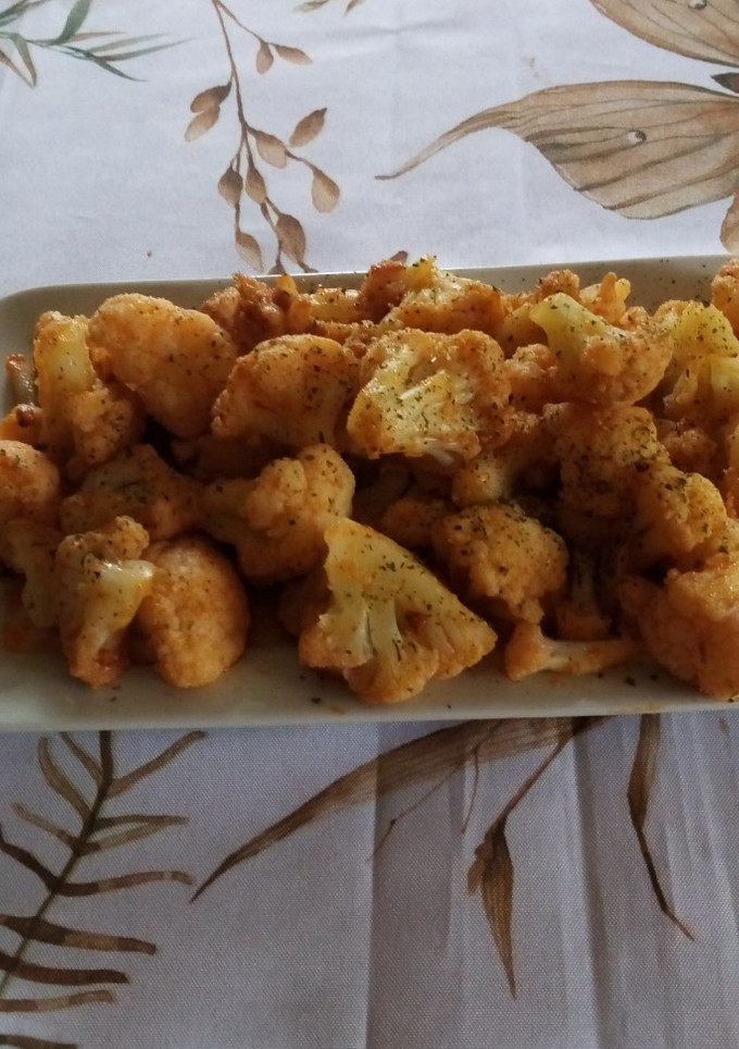 Una foto de Coliflor al ajillo