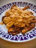 Stroganoff de ternera con patatas especiadas al horno