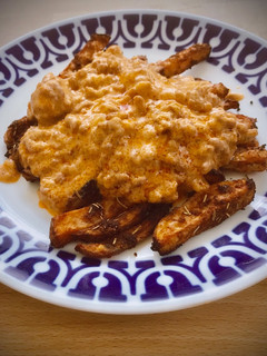 Una foto de Stroganoff de ternera con patatas especiadas al horno