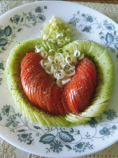 A picture of Cucumber, tomato and leek salad.