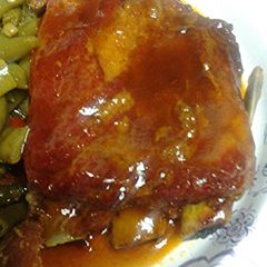A picture of Ribs, in the oven.