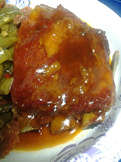 A picture of Ribs, in the oven.