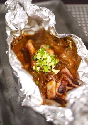 A picture of Preparing Foil-Baked Squid.