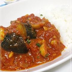 A picture of Eggplant & Chicken Tomato Curry.