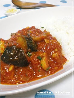 A picture of Eggplant & Chicken Tomato Curry.