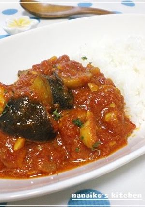 A picture of Eggplant & Chicken Tomato Curry.