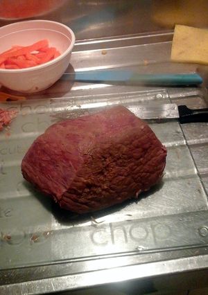 A picture of Slow cooked corned beef with creamy mash.