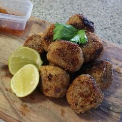A picture of POLENTA crusted CHICKEN & VEAL SESAME MEATBALLS.
