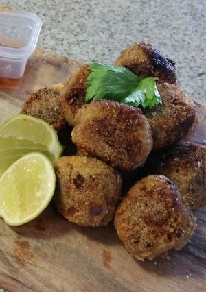 A picture of POLENTA crusted CHICKEN & VEAL SESAME MEATBALLS.