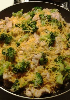 A picture of Pork with Broccoli and Rice.