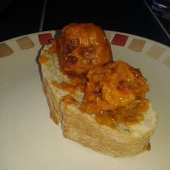 A picture of Meatballs in Fried Tomato Sauce.