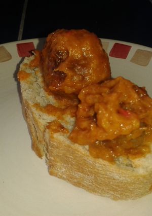 A picture of Meatballs in Fried Tomato Sauce.
