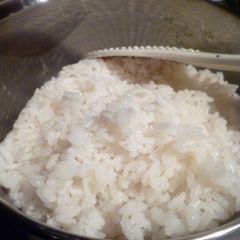 A picture of Cooking Rice in a Pot Without it Boiling Over.