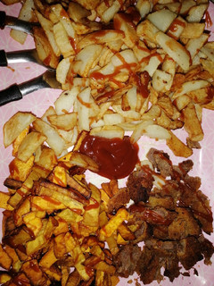 Una foto de Boniato frito