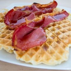 A picture of 'Twisted' waffles with bacon.