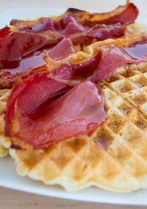 A picture of 'Twisted' waffles with bacon.