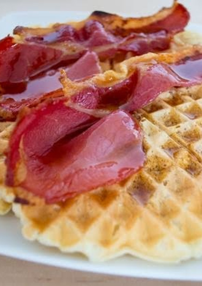 A picture of 'Twisted' waffles with bacon.