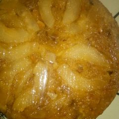 A picture of Up-side-down fresh Pear Cake with nuts.