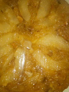 A picture of Up-side-down fresh Pear Cake with nuts.