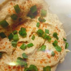 A picture of Garlic hummus with a kick.