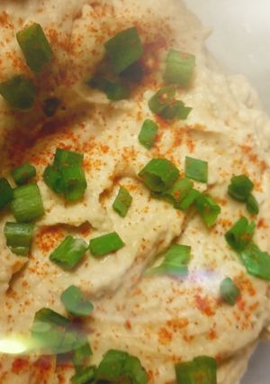 A picture of Garlic hummus with a kick.