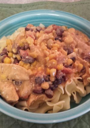 A picture of Slow Cooker Creamy White Chicken Chili & Noodles.