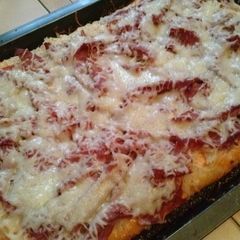 A picture of Corned Beef Reuben Pizza.