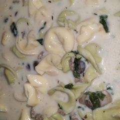 A picture of Creamy Tortellini Spinach Mushroom Soup with Turkey Sausage.