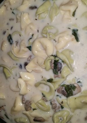 A picture of Creamy Tortellini Spinach Mushroom Soup with Turkey Sausage.