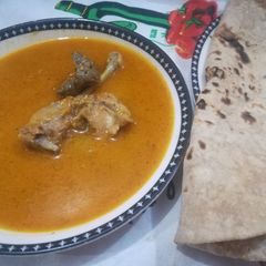 A picture of Desi chicken qorma.