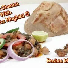 A picture of PALAK CHAANA WiTH PARATHA MUGHLAI.