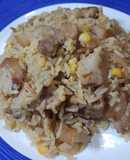 Arroz con chuleta de cerdo y maíz tierno