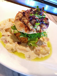 A picture of Grilled Fish with Awadhi Creamy Potato, Veggie Rosti & Greens.