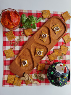 Una foto de Crackers de tomates secos y orégano