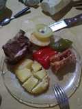 Asado a la parrilla de pecho y colita especiadas