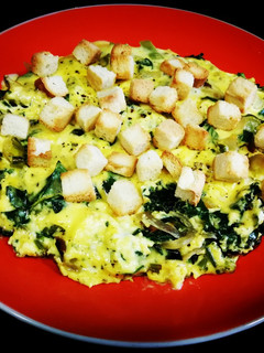 Una foto de Acelga con huevos y queso al aroma de pimienta negra