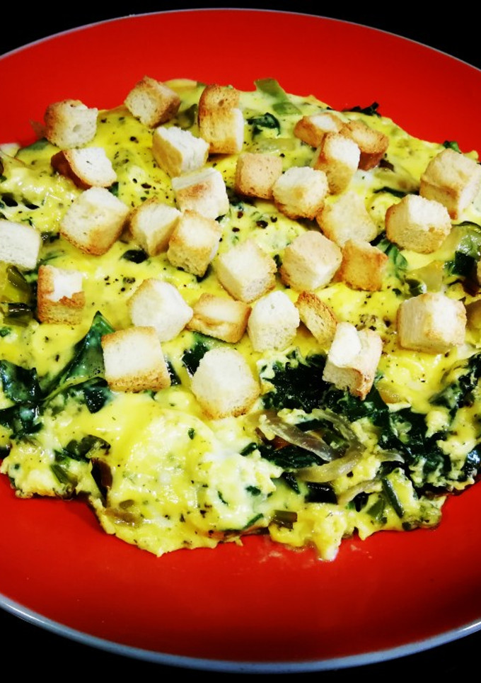 Una foto de Acelga con huevos y queso al aroma de pimienta negra