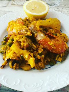 Una foto de Arroz meloso con verduras gambón, sepia y pollo